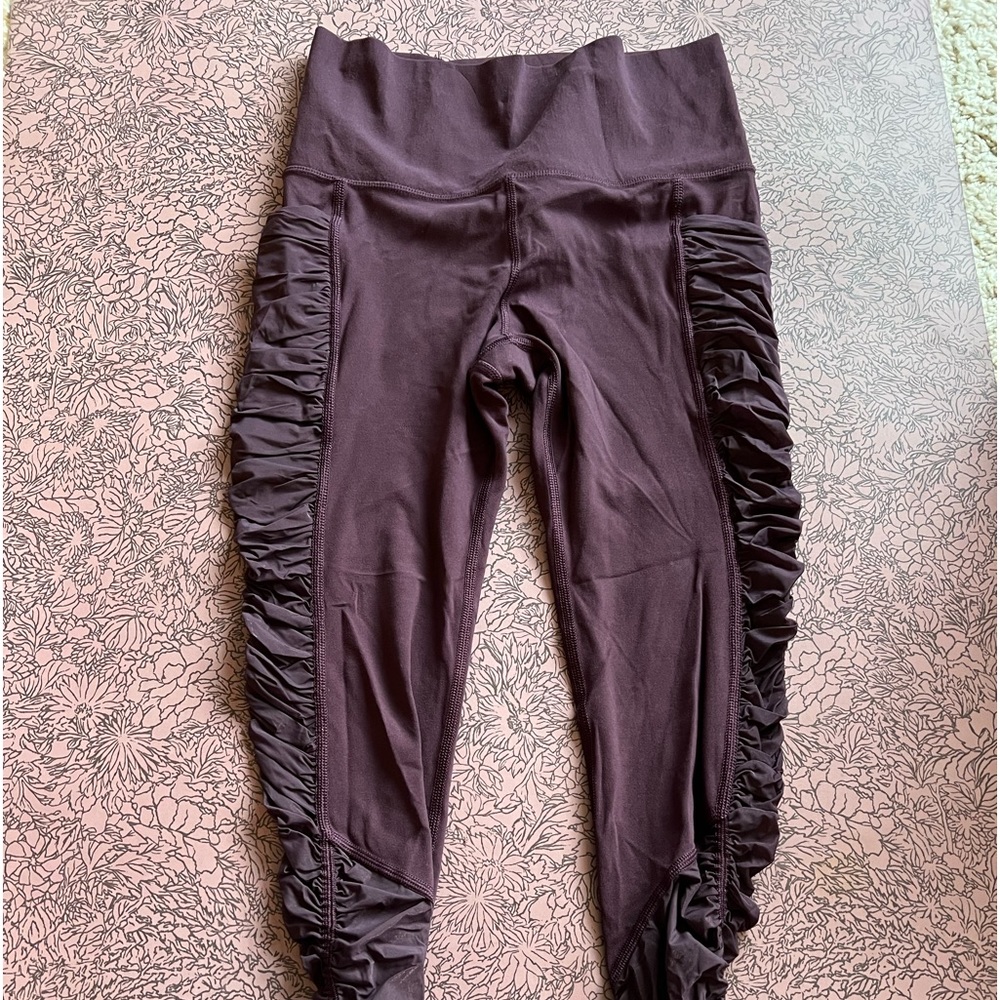 Athleta purple tight with sheer/mesh panels. Size small